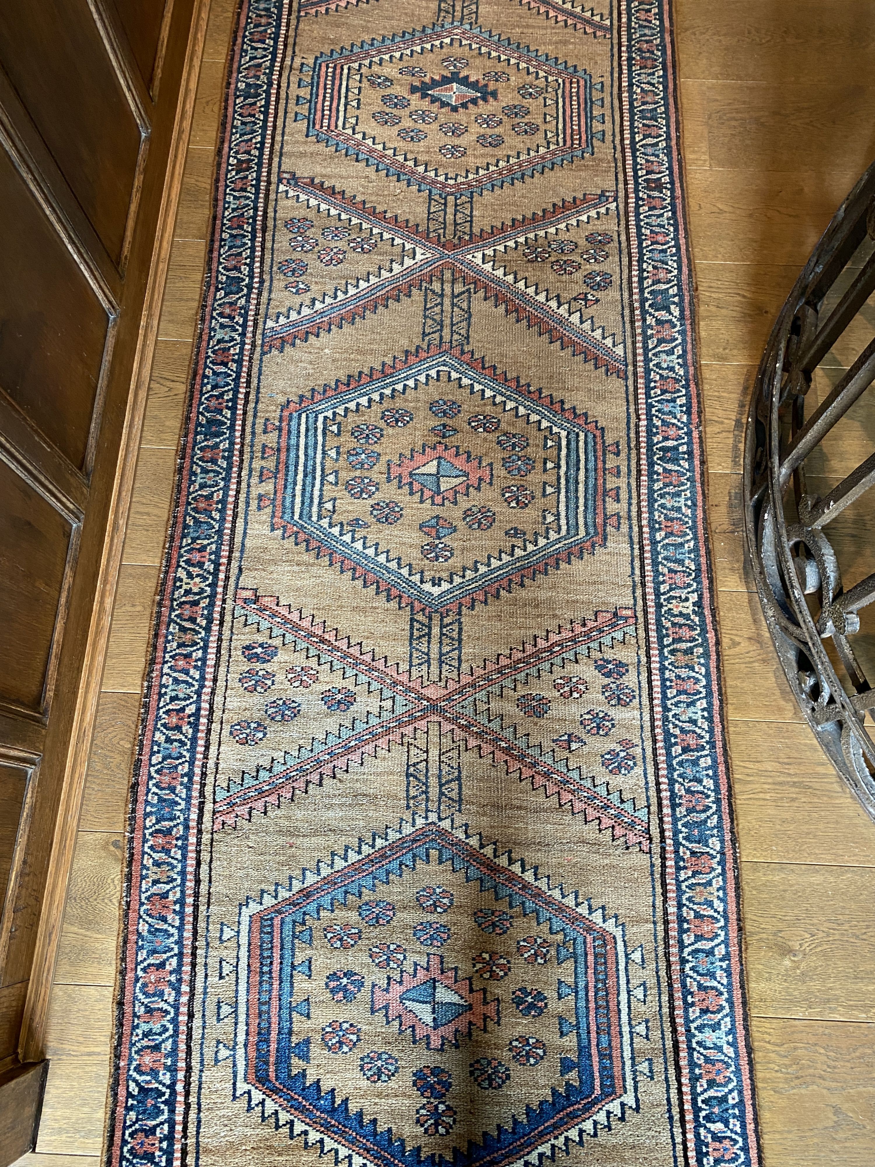 A Caucasian style pale brown ground runner, with hexagonal motifs, 382 x 77cm